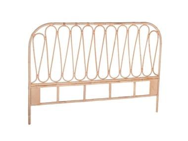 "Elevate your bedroom decor with this timeless and tasteful cane wooden headboard."