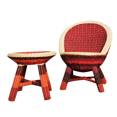 "An image of a wooden chair with a handwoven seat and backrest. The chair features a colorful pattern with stripes of various shades of blue, green, yellow, and red. The legs are made of wood and have a natural finish."