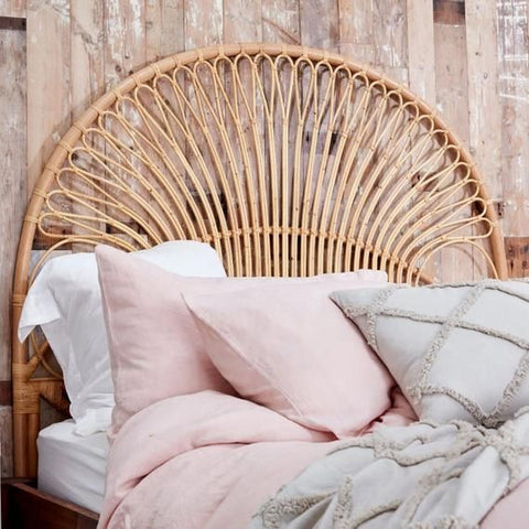 "Bring rustic vibes to your bedroom with this stunning wooden cane headboard."